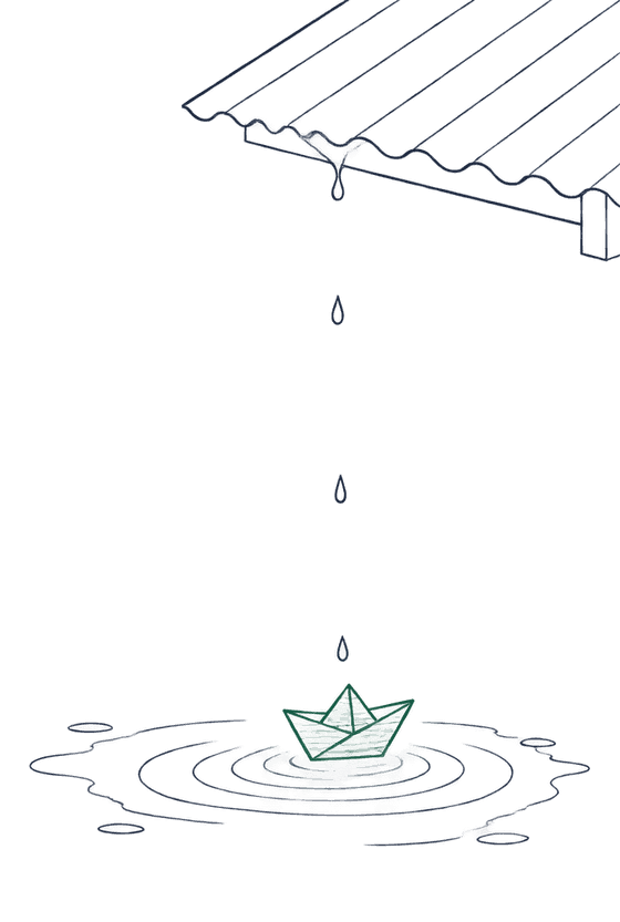 A raindrop falls from a tin roof into a puddle; ripples carry a paper boat